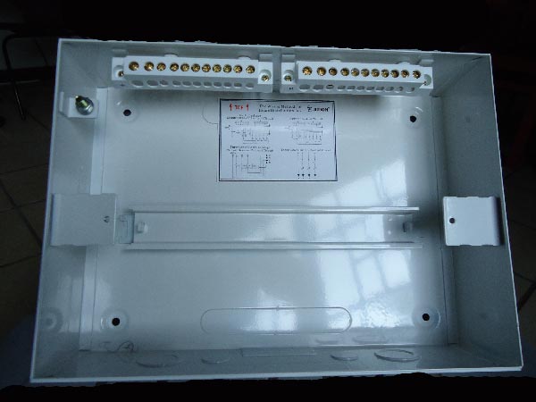 Inside look of a Single Raw Distribution Board. The two Link Bars on top are for the Earth and Neutral cable connectionsIn the middle, there is a DIN rail for fixing MCBs and RCD.